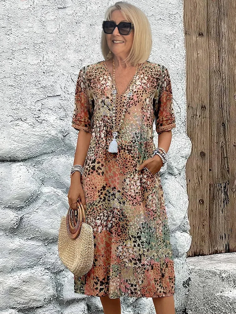 Susan | Robe Midi Vibrante Avec Couverture Élégante Du Ventre