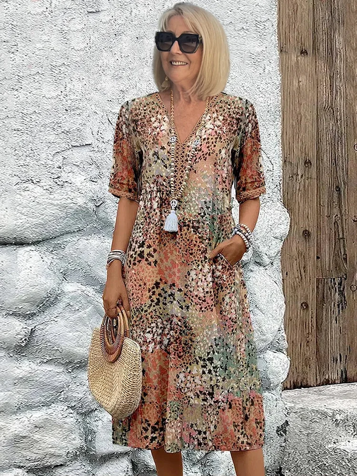 Susan | Robe Midi Vibrante Avec Couverture Élégante Du Ventre