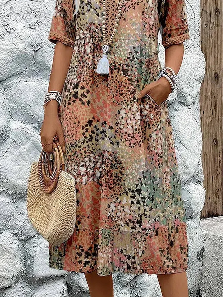 Susan | Robe Midi Vibrante Avec Couverture Élégante Du Ventre
