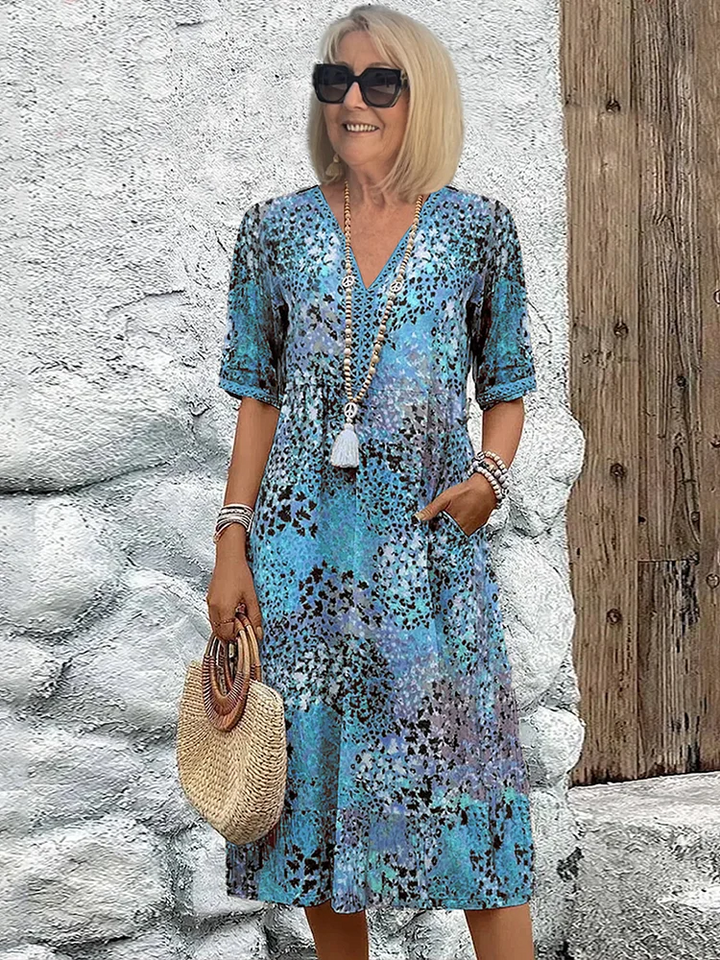 Susan | Robe Midi Vibrante Avec Couverture Élégante Du Ventre